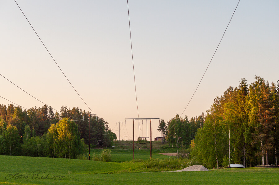 SE_Norrbotten_power_lines_opening_forest_dusk_summer900